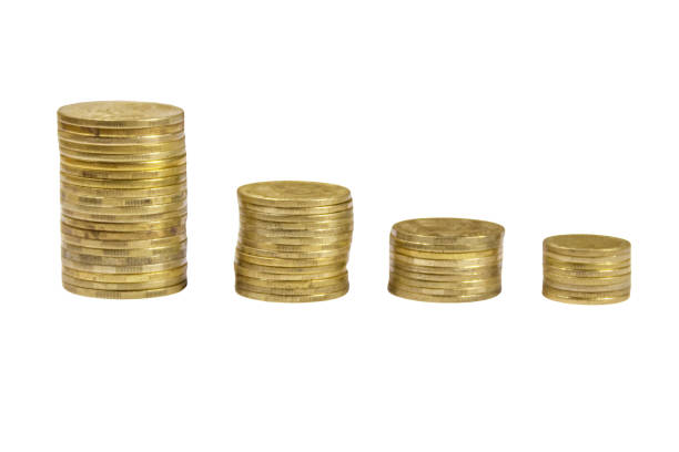 istock Stacks of golden coins isolated on white background 935816192