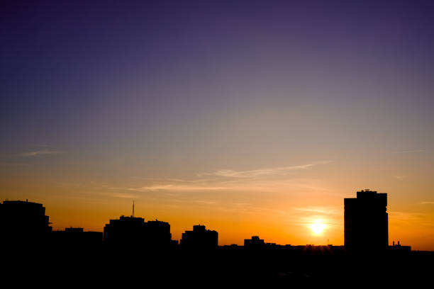 istock city silhouette in sunset 935818642
