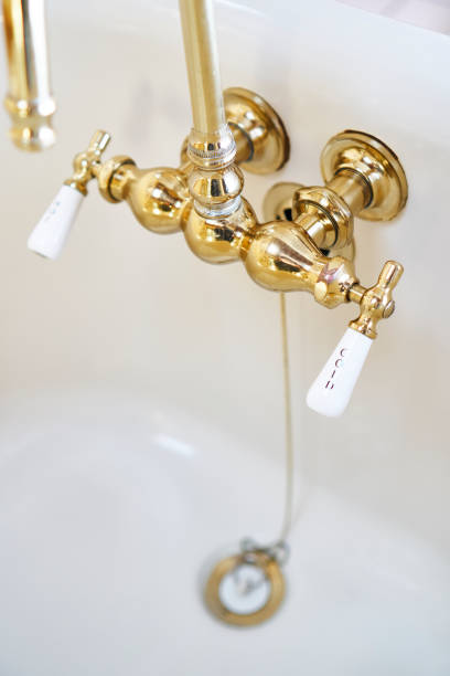 istock Vintage brass faucet in bathtub 935818908