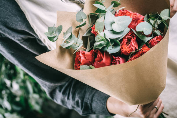 istock Red rose in brides flower bouquet 935819102