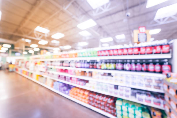 istock Blurred abstract soft drinks aisle in American store 935824346
