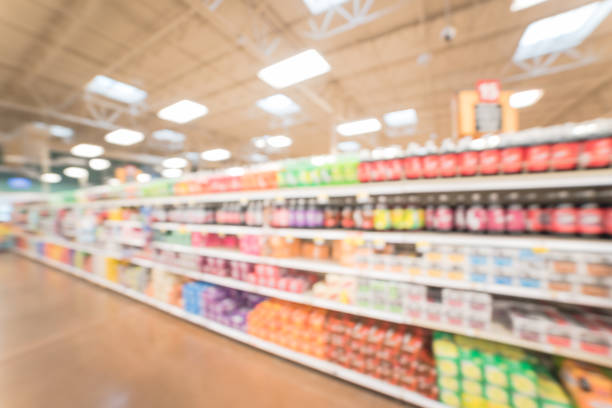 istock Blurred abstract soft drinks aisle in American store 935824478