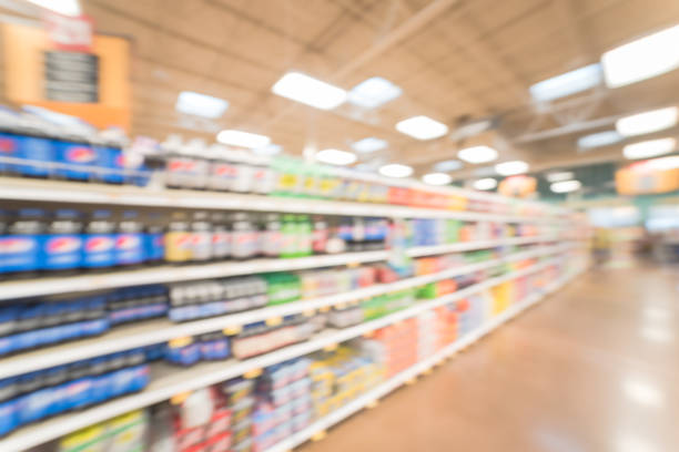 istock Blurred abstract soft drinks aisle in American store 935824754