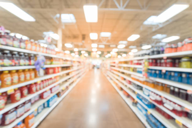 istock Blurred abstract soft drinks aisle in American store 935824942