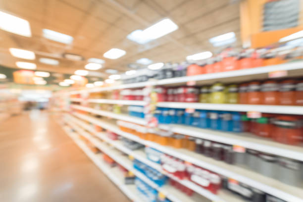 istock Blurred abstract soft drinks aisle in American store 935824972