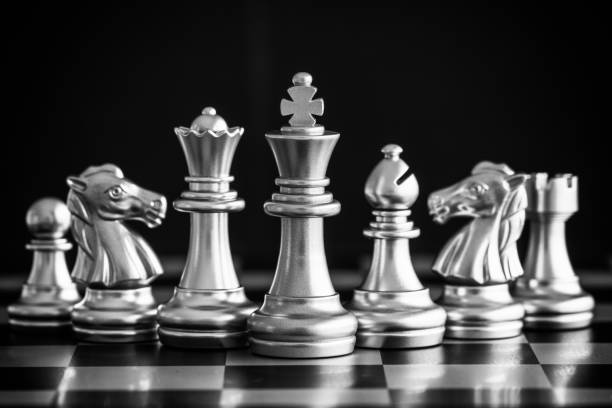 istock Strategy chess battle Intelligence challenge game on chessboard. Success the strategy concept. Chess business leader and success idea. Chess strategy game business competition success play. 935824984
