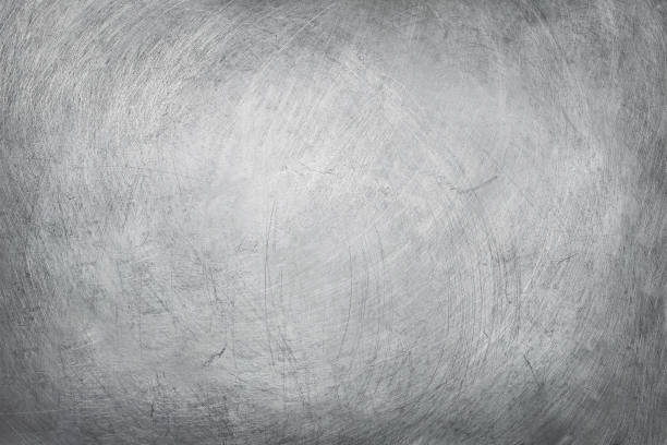 istock aluminium texture background, scratches on stainless steel. 935827456