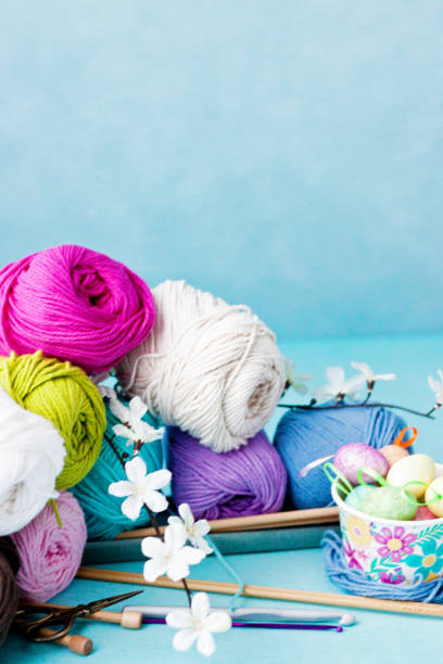 istock Easter crafts, Easter eggs, cherry blossom, knitting and crochet, wool and hook 935837052