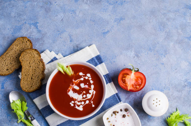 Traditional tomato soup Traditional tomato soup with cream in a plate on the table. Selective focus. kosher starter recipes stock pictures, royalty-free photos & images