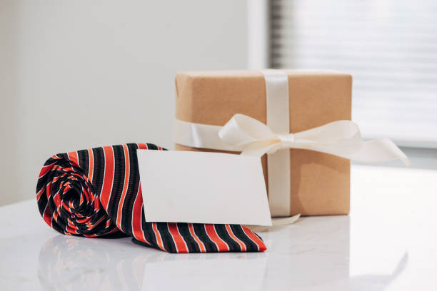 istock Flatlay, necktie and blank frame. Father's day concept 935849502