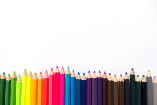 istock hand holding paintbrush,blurred background. 935891958