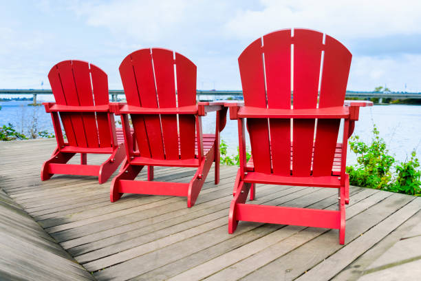 istock empty red chaise longue stand on the wooden floor 935906712