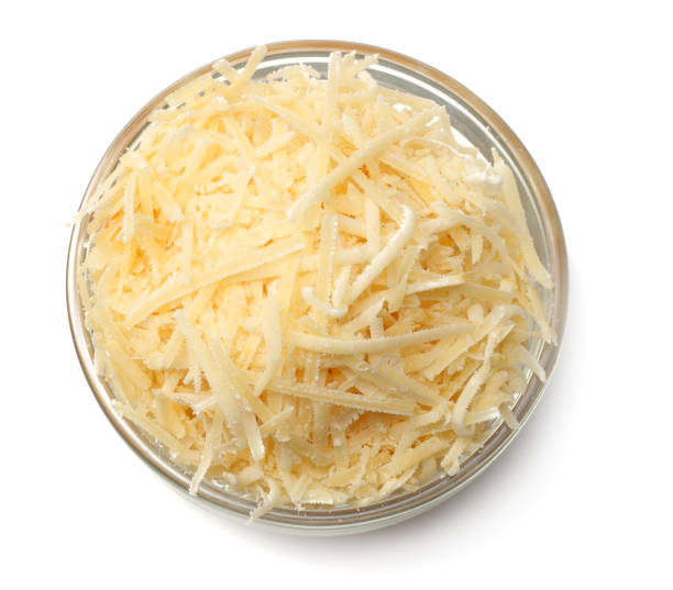 istock grated cheese isolated on white background. top view 935913874