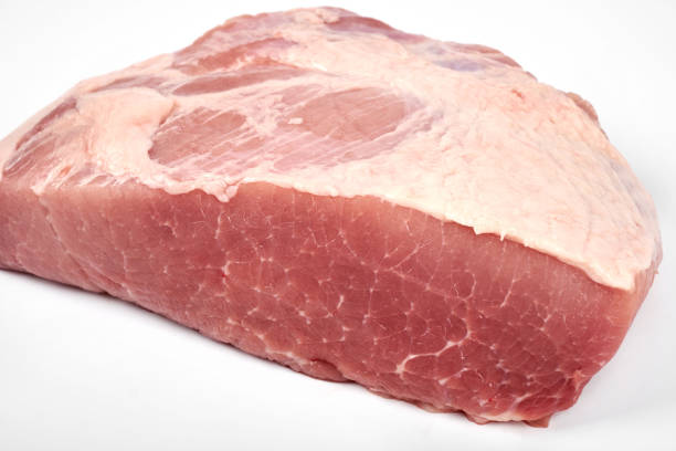 istock A large piece of pork isolated on white 935916654