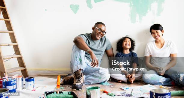 Black Family Painting House Wall Stock Photo - Download Image Now - Family, Painting - Activity, House