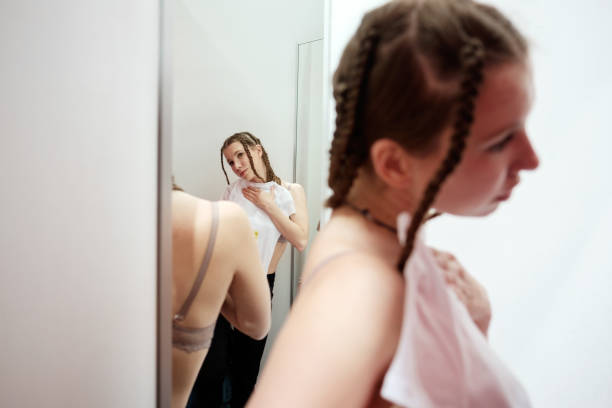 istock girl in dressing room 935924298