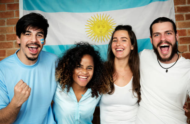 istock Friends cheering world cup with painted flag 935929810