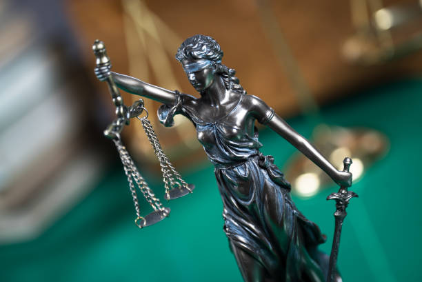istock Law concept with Themis, symbol of justice. 935945276