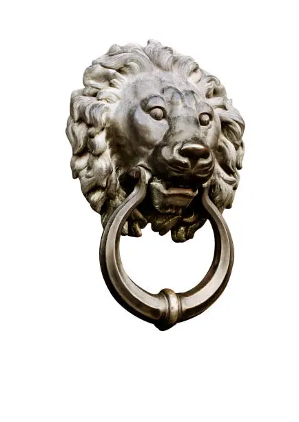 Lion head door knocker isolated over white