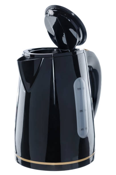 istock Black and beige color plastic isolated cordless electrical kettle on white background 935954400