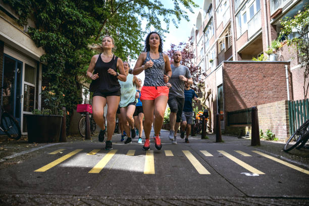 istock Urban runners crew training in the city 935966640