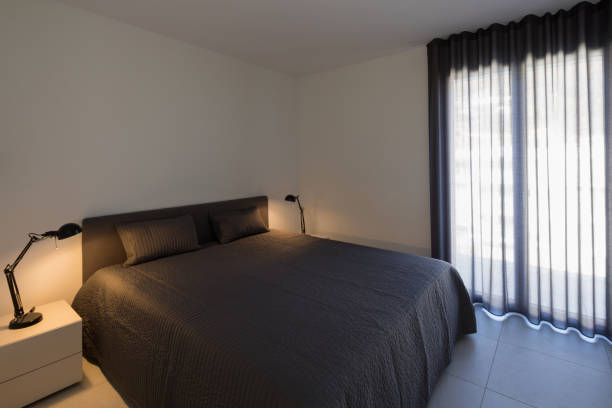 istock Large bedroom in a modern apartment 935967208