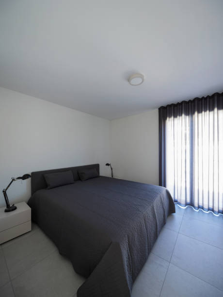 istock Large bedroom in a modern apartment 935967272
