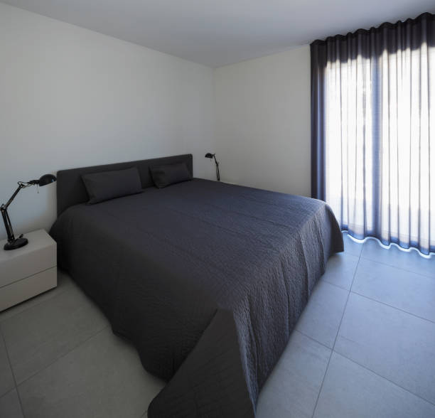istock Large bedroom in a modern apartment 935967322