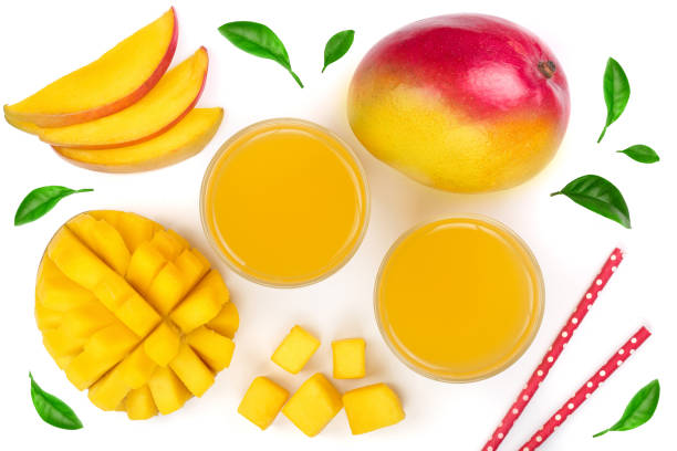 istock Mango juice and fruit isolated on white background close-up. Top view. Flat lay 935967564