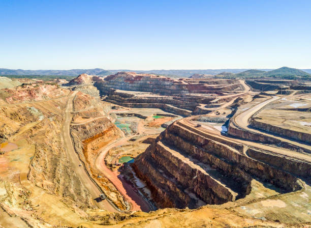 istock Aerial view of huge, open pit mine 935973976