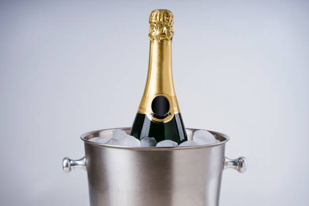 istock Luxury champagne bottle in ice bucket 935974282