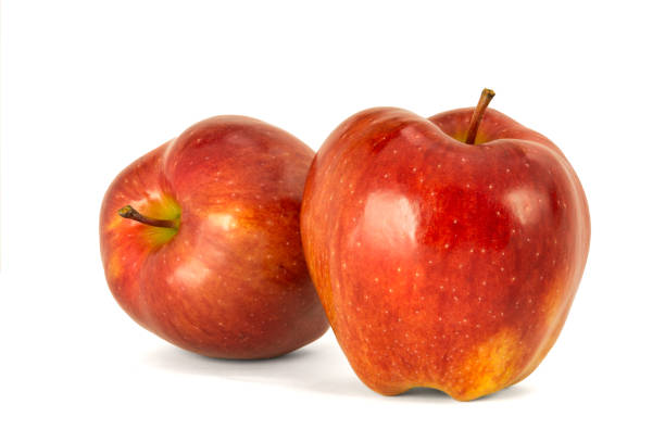 istock Variety of ripe red apples Red Chief isolate white background. Procurement under inscription and illustration 935978546