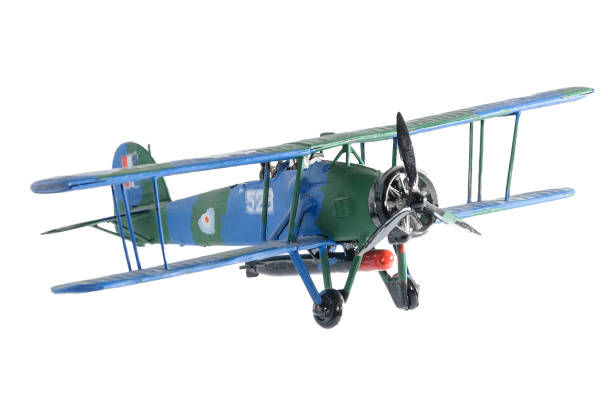 istock Blue plastic biplane isolated on the white background 935979230