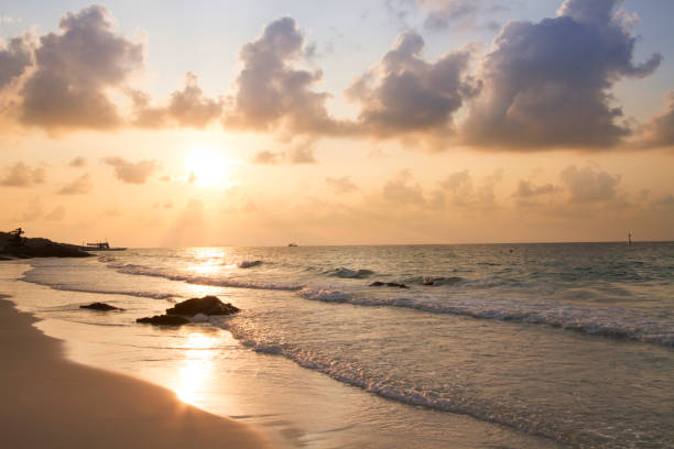 istock Beautiful sunrise at island beach on summer 935982620