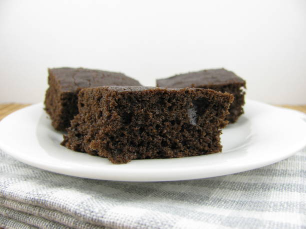 istock Delicious cake on a carob base on a plate 935986312