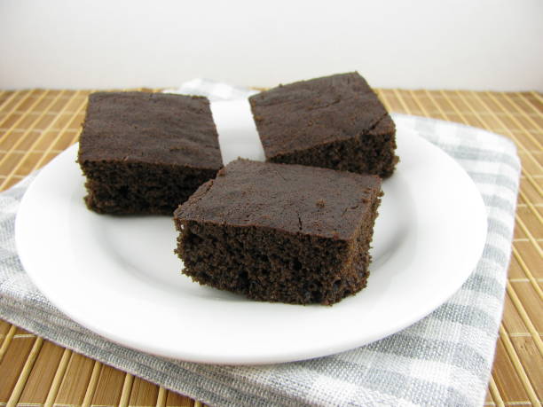 istock Delicious cake on a carob base on a plate 935986316