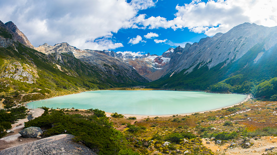 Andes mountains and lake Laguna Esmeralda near Ushuaia in Tierra del Fuego, Argentina. Panoramic photo