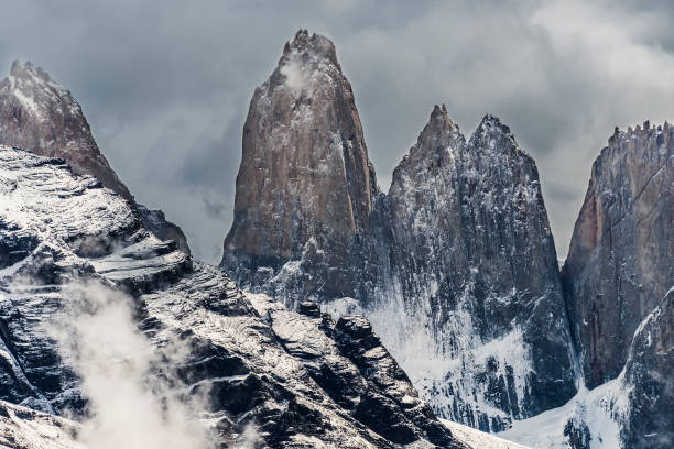 istock Torres del Paine peaks coming from clouds 935986396