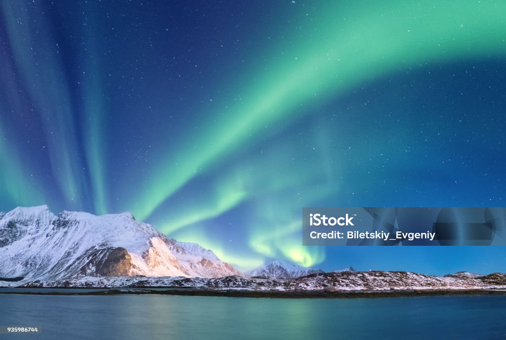 Northen light under mountains. Beautiful natural landscape in the Norway Aurora Borealis Stock Photo