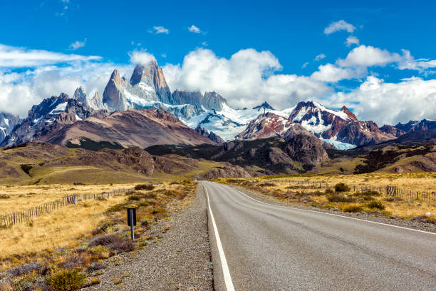 Road and panorama with Fitz Roy mountain at Los Glaciares National Park stock photo