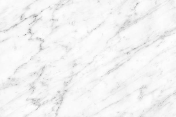 istock White Carrara Marble natural light surface for bathroom or kitchen countertop 935993170