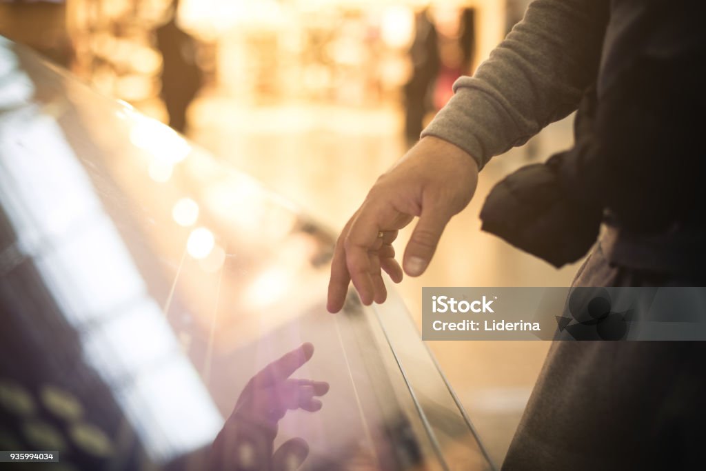 Modern technology. Man on airport using modern technology. Space for copy. Close up. Kiosk Stock Photo