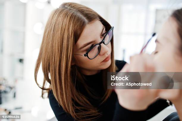 Make Up Artist Work In Her Beauty Visage Studio Salon Woman Applying By Professional Make Up Master Beauty Club Concept Stock Photo - Download Image Now