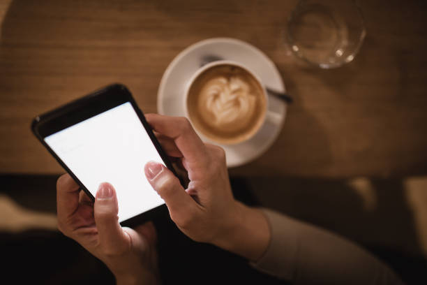 istock Single. Young woman enjoying coffee  in cafe 935997722