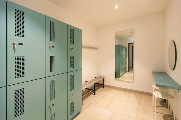 istock Dressing room with turquoise lockers 936001600