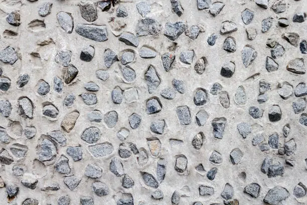 Concrete background texture - concrete wall with stones