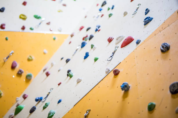istock Climbing Wall. Climbing wall with colorful rocks 936031900