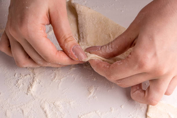 istock Woman doing apricot turnover 936078184