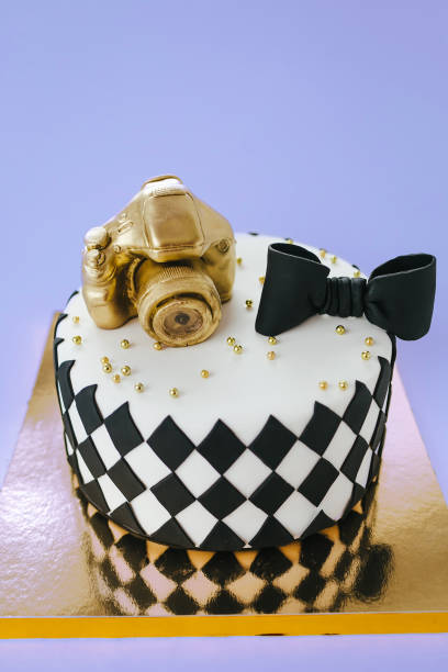 istock Black and White Birthday Cake For Photographer On Blue Background. 936078780