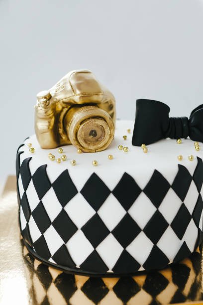 istock Black and White Birthday Cake For Photographer On White Background. 936078816